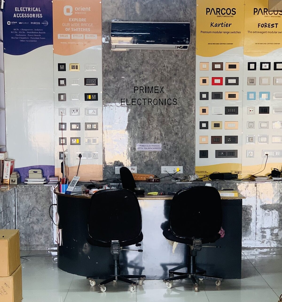 Primex Electronics shop counter in Mirganj, Arrah, displaying Orient Electric and Parcos switch ranges
